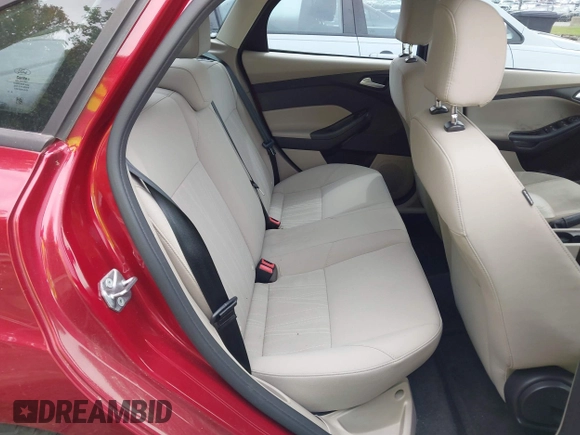 2015 Ford Focus SE with VIN 1FADP3F22FL259223, listed as a IAAI auction lot 42333439 with 77,111 mi miles and . Bid and sale history available at DreamBid. Image 8.