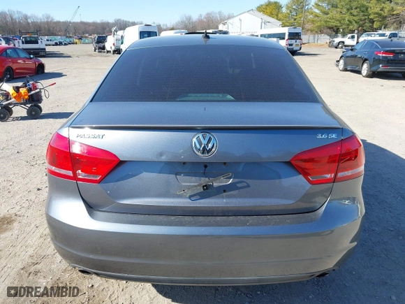 2013 Volkswagen Passat SE w/Sunroof with VIN 1VWBM7A30DC125919, listed as a IAAI auction lot 41759051 with 112,952 mi miles. Bid and sale history available at carsss.com. Image 16.