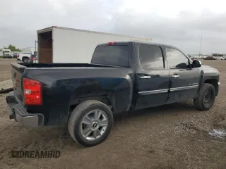 2013 Chevrolet Silverado 1500 LT with VIN 3GCPCSE00DG372708, listed as a Copart auction lot 51591465 with 210,934 mi miles and Salvage Title. Bid and sale history available at DreamBid. Image 3.