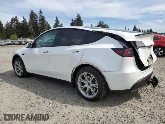 2020 Tesla Model Y Long Range with VIN 5YJYGDEF2LF006357, listed as a Copart auction lot 54888215 with 55,983 mi miles and Salvage Title. Bid and sale history available at DreamBid. Image 2.