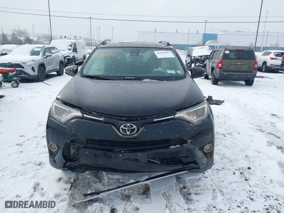 2018 Toyota RAV4 XLE with VIN 2T3RFREV8JW851250, listed as a IAAI auction lot 41164994 with 63,005 mi miles. Bid and sale history available at carsss.com. Image 12.