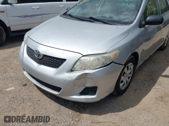 2009 Toyota Corolla with VIN JTDBL40E099041319, listed as a IAAI auction lot 42119698 with 205,666 mi miles. Bid and sale history available at carsss.com. Image 6.