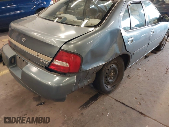 2000 Nissan Altima XE with VIN 1N4DL01D4YC185986, listed as a IAAI auction lot 41831774 with 217,044 mi miles. Bid and sale history available at carsss.com. Image 6.