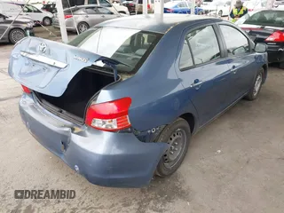 2009 Toyota Yaris with VIN JTDBT903791302911, listed as a IAAI auction lot 42181264 with 183,321 mi miles. Bid and sale history available at carsss.com. Image 4.