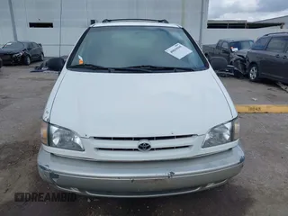 1999 Toyota Sienna LE with VIN 4T3ZF13C1XU152733, listed as a IAAI auction lot 40819395 with 184,540 mi miles. Bid and sale history available at carsss.com. Image 12.
