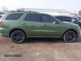 2021 Dodge Durango GT Plus with VIN 1C4RDJDGXMC663928, listed as a IAAI auction lot 42070119 with 77,110 mi miles and . Bid and sale history available at DreamBid. Image 13.