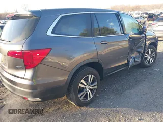 2017 Honda Pilot EX-L z VIN 5FNYF6H70HB069712, wystawiony jako IAAI lot #41828893 z przebiegiem 70 061 mil mil oraz . Historia ofert i sprzedaży dostępna na DreamBid. Obrazek 4.