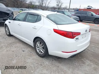 2013 Kia Optima LX with VIN KNAGM4A76D5379047, listed as a IAAI auction lot 41973373 with 135,454 mi miles. Bid and sale history available at carsss.com. Image 3.