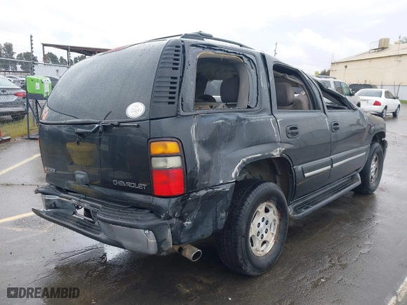 2005 Chevrolet Tahoe Z71 with VIN 1GNEC13T15R205653, listed as a IAAI auction lot 41808672 with 210,261 mi miles. Bid and sale history available at carsss.com. Image 4.