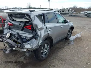 2016 Toyota RAV4 LE with VIN 2T3BFREV8GW432986, listed as a IAAI auction lot 41716530 with 143,442 mi miles. Bid and sale history available at carsss.com. Image 4.