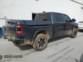 2020 Ram 1500 Rebel with VIN 1C6SRFLTXLN118580, listed as a Copart auction lot 54585955 with 39,028 mi miles and Salvage title. Bid and sale history available at DreamBid. Image 3.
