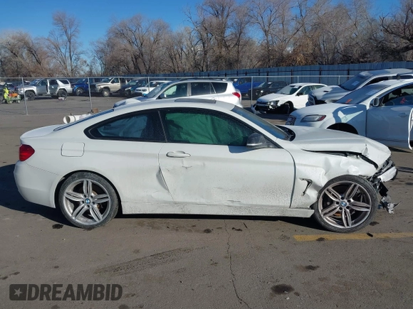 2014 BMW 4 Series 435i with VIN WBA3R1C56EK191996, listed as a IAAI auction lot 41450981 with 125,352 mi miles and . Bid and sale history available at carsss.com. Image 13.