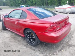 1994 Ford Mustang with VIN 1FALP4047RF117240, listed as a IAAI auction lot 42315542 with 120,825 mi miles and . Bid and sale history available at DreamBid. Image 3.