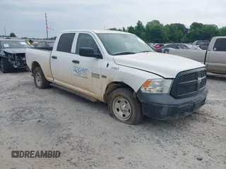 2016 Ram 1500 Tradesman z VIN 1C6RR7ST6GS133638, wystawiony jako IAAI lot #42162303 z przebiegiem 50 898 mil mil oraz . Historia ofert i sprzedaży dostępna na DreamBid. Obrazek 1.
