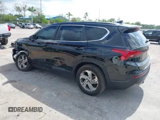 2021 Hyundai Santa Fe SE z VIN 5NMS14AJ0MH332918, wystawiony jako IAAI lot #42365534 z przebiegiem 58 720 mil mil oraz . Historia ofert i sprzedaży dostępna na DreamBid. Obrazek 3.