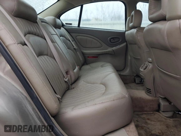 2001 Pontiac Bonneville SE z VIN 1G2HX54K414249469, wystawiony jako Copart lot #46934415 z przebiegiem 112 292 mil mil oraz Szkoda całkowita • Salvage title. Historia ofert i sprzedaży dostępna na DreamBid. Obrazek 10.