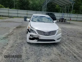 2014 Hyundai Azera with VIN KMHFG4JG3EA348610, listed as a Copart auction lot 61242735 with 190,846 mi miles and Salvage title. Bid and sale history available at DreamBid. Image 13.