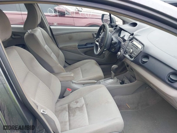 2010 Honda Insight EX with VIN JHMZE2H7XAS024879, listed as a IAAI auction lot 42029553 with 187,648 mi miles. Bid and sale history available at carsss.com. Image 5.