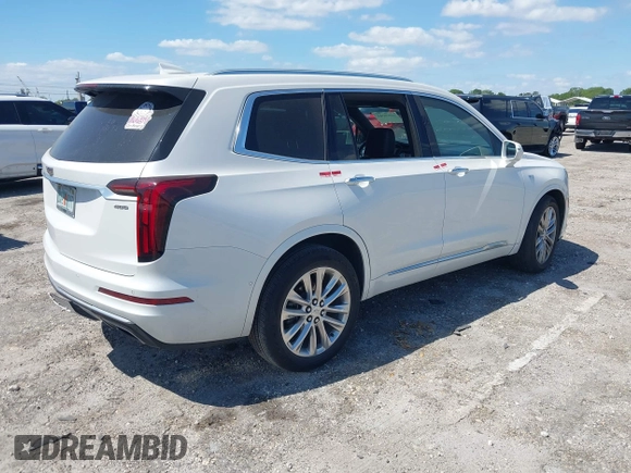 2020 Cadillac XT6 FWD Premium Luxury z VIN 1GYKPCRS1LZ228982, wystawiony jako IAAI lot #41975364 z przebiegiem 84 803 mil mil oraz . Historia ofert i sprzedaży dostępna na DreamBid. Obrazek 4.
