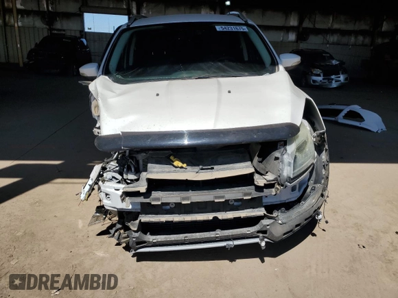 2016 Ford Escape Titanium with VIN 1FMCU9J91GUA11090, listed as a Copart auction lot 54231675 with 135,735 mi miles and Salvage Title. Bid and sale history available at DreamBid. Image 5.