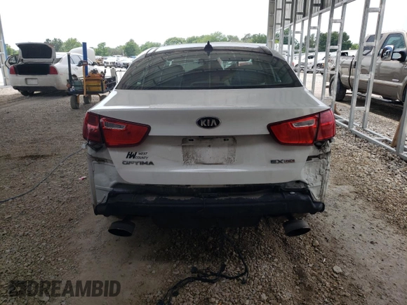2015 Kia Optima EX z VIN 5XXGN4A75FG452374, wystawiony jako Copart lot #59928725 z przebiegiem 162 831 mil mil oraz Szkoda całkowita • Salvage title. Historia ofert i sprzedaży dostępna na DreamBid. Obrazek 6.