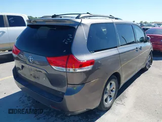 2014 Toyota Sienna LE AAS with VIN 5TDKK3DC8ES457023, listed as a IAAI auction lot 42067713 with 335,130 mi miles. Bid and sale history available at carsss.com. Image 4.