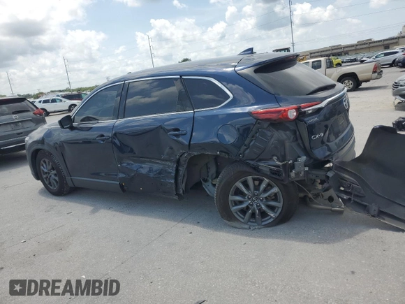2020 Mazda CX-9 Touring with VIN JM3TCACY1L0423340, listed as a Copart auction lot 57389305 with 64,737 mi miles and Salvage title. Bid and sale history available at DreamBid. Image 2.