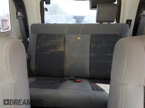 2008 Jeep Wrangler X с VIN 1J4FZ24188L503312, выставлен на аукционе Copart как лот 62013324 с пробегом 174 344 миль миль и Списание • Salvage title. История ставок и продаж доступна на DreamBid. Изображение 10.