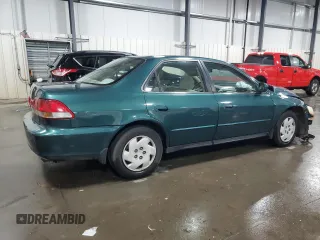 2002 Honda Accord LX z VIN 1HGCG16442A043585, wystawiony jako Copart lot #74481474 z przebiegiem 223 446 mil mil oraz Szkoda całkowita • Salvage title. Historia ofert i sprzedaży dostępna na DreamBid. Obrazek 3.