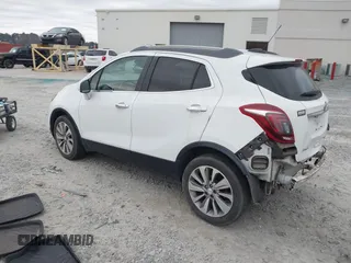 2017 Buick Encore Essence with VIN KL4CJCSB7HB011839, listed as a IAAI auction lot 41303660 with 80,789 mi miles and . Bid and sale history available at carsss.com. Image 3.