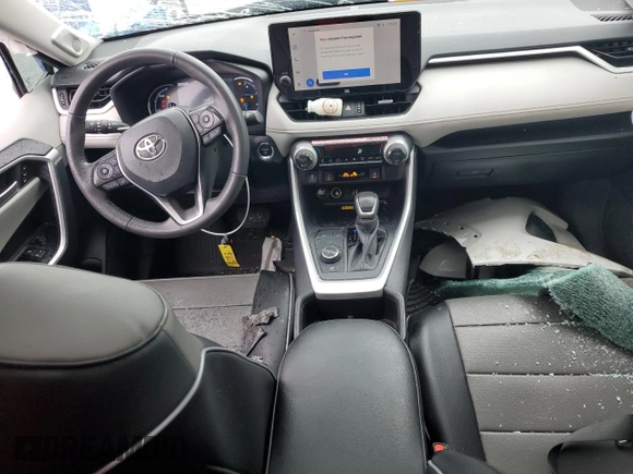2024 Toyota RAV4 Hybrid XLE Premium with VIN 2T3B6RFV8RW074600, listed as a Copart auction lot 59560115 with 23,839 mi miles and Salvage title. Bid and sale history available at DreamBid. Image 8.
