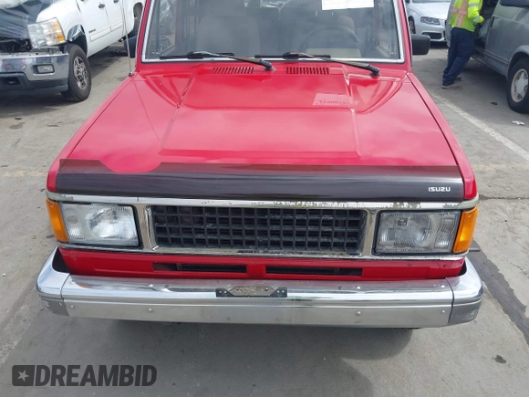 1991 Isuzu Trooper z VIN JACCH58R0M7904092, wystawiony jako IAAI lot #41900283 z przebiegiem 226 780 mil mil oraz . Historia ofert i sprzedaży dostępna na DreamBid. Obrazek 6.