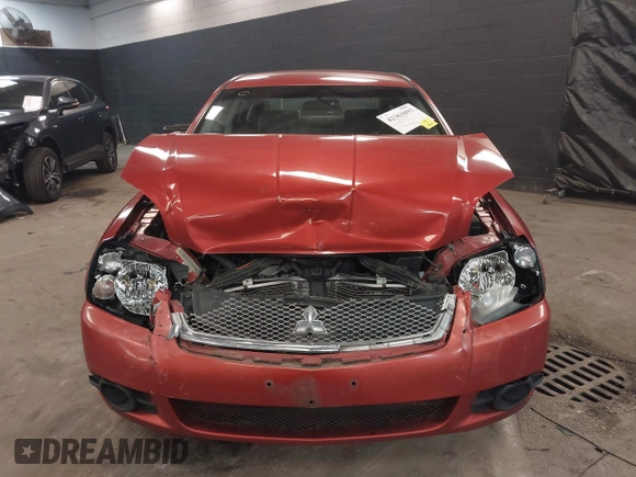 2010 Mitsubishi Galant FE z VIN 4A32B2FF8AE012585, wystawiony jako IAAI lot #42363093 z przebiegiem 182 601 mil mil oraz . Historia ofert i sprzedaży dostępna na DreamBid. Obrazek 12.