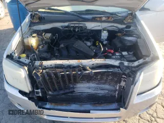 2008 Mercury Mariner Premier z VIN 4M2CU97108KJ43593, wystawiony jako Copart lot #62006105 z przebiegiem 124 233 mil mil oraz Szkoda całkowita • Salvage title. Historia ofert i sprzedaży dostępna na DreamBid. Obrazek 12.