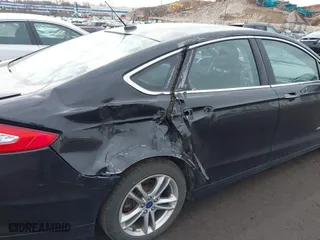 2015 Ford Fusion Titanium Hybrid with VIN 3FA6P0RU6FR299374, listed as a IAAI auction lot 41576007 with 191,285 mi miles. Bid and sale history available at carsss.com. Image 6.