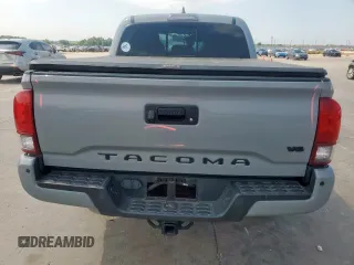 2019 Toyota Tacoma SR z VIN 5TFCZ5AN6KX211952, wystawiony jako Copart lot #58964815 z przebiegiem 97 774 mil mil oraz Szkoda całkowita • Salvage title. Historia ofert i sprzedaży dostępna na DreamBid. Obrazek 6.