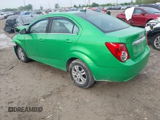 2015 Chevrolet Sonic LT with VIN 1G1JC5SB8F4168860, listed as a IAAI auction lot 42163278 with 102,855 mi miles and . Bid and sale history available at DreamBid. Image 3.