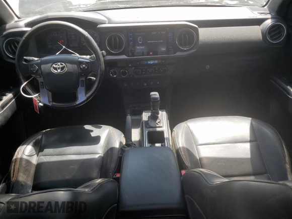 2019 Toyota Tacoma SR with VIN 5TFCZ5ANXKX184626, listed as a Copart auction lot 59220905 with 123,746 mi miles and Salvage title. Bid and sale history available at DreamBid. Image 8.