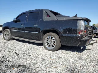 2010 Chevrolet Avalanche LTZ with VIN 3GNNCGE04AG250747, listed as a Copart auction lot 48952615 with 142,136 mi miles and Salvage Title. Bid and sale history available at DreamBid. Image 2.