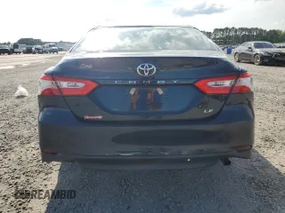 2018 Toyota Camry LE with VIN 4T1B11HK0JU565596, listed as a Copart auction lot 60219235 with 9,809 mi miles and Salvage title. Bid and sale history available at DreamBid. Image 6.