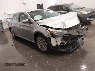2015 Toyota Avalon Limited with VIN 4T1BK1EB6FU167964, listed as a IAAI auction lot 41904265 with 106,208 mi miles and . Bid and sale history available at carsss.com. Image 1.
