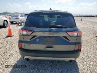 2020 Ford Escape Titanium Hybrid z VIN 1FMCU0DZ1LUC38345, wystawiony jako Copart lot #59628985 z przebiegiem 86 917 mil mil oraz Szkoda całkowita • Salvage title. Historia ofert i sprzedaży dostępna na DreamBid. Obrazek 6.