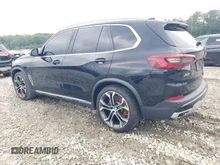 2020 BMW X5 sDrive40i with VIN 5UXCR4C0XLLW63728, listed as a Copart auction lot 56112475 with 65,704 mi miles and Clean title. Bid and sale history available at DreamBid. Image 2.