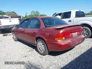 1998 Saturn SL z VIN 1G8ZK5270WZ223002, wystawiony jako IAAI lot #41959507 z przebiegiem Nie podano mil oraz . Historia ofert i sprzedaży dostępna na DreamBid. Obrazek 3.