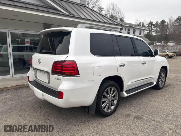 2011 Lexus LX 570 with VIN JTJHY7AX9B4071559, listed as a IAAI auction lot 41860921 with 201,449 mi miles and . Bid and sale history available at DreamBid. Image 4.