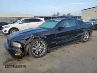 2012 Ford Mustang GT Premium with VIN 1ZVBP8CF6C5271586, listed as a Copart auction lot 83878894 with 101,016 mi miles and Salvage Title. Bid and sale history available at carsss.com. Image 1.