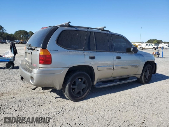 2003 GMC Envoy SLT z VIN 1GKDS13S832228632, wystawiony jako Copart lot #50330805 z przebiegiem 224 605 mil mil oraz Szkoda całkowita • Salvage title. Historia ofert i sprzedaży dostępna na DreamBid. Obrazek 3.