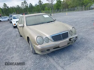 2000 Mercedes-Benz E 320 z VIN WDBJF65J6YB107172, wystawiony jako IAAI lot #42004480 z przebiegiem 149 432 mil mil oraz . Historia ofert i sprzedaży dostępna na DreamBid. Obrazek 1.