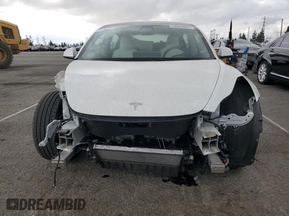 2021 Tesla Model 3 Standard Range Plus with VIN 5YJ3E1EA6MF066064, listed as a Copart auction lot 54063625 with 27,424 mi miles and Salvage Title. Bid and sale history available at DreamBid. Image 5.