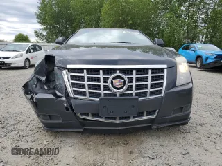 2014 Cadillac CTS with VIN 1G6DA1E39E0104049, listed as a Copart auction lot 56198085 with 121,622 mi miles and Salvage Title. Bid and sale history available at DreamBid. Image 5.
